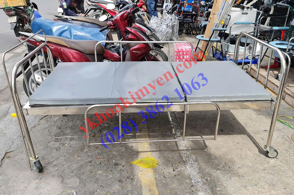 Giường inox 1 tay quay có nệm có vây có bánh xe